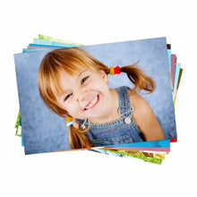 Impressão de foto de criança sorrindo em papel fotográfico A4 da Loja Kiwy